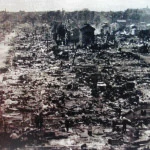 Archive photograph of Tokyo burnt flat after the wartime air raids, seen across the ruined city