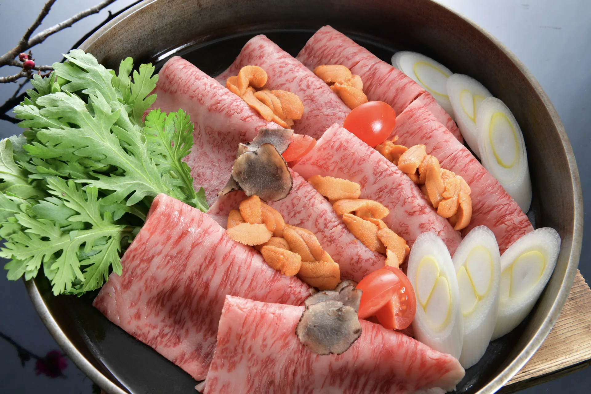 Japanese wagyu sukiyaki prepared at the table